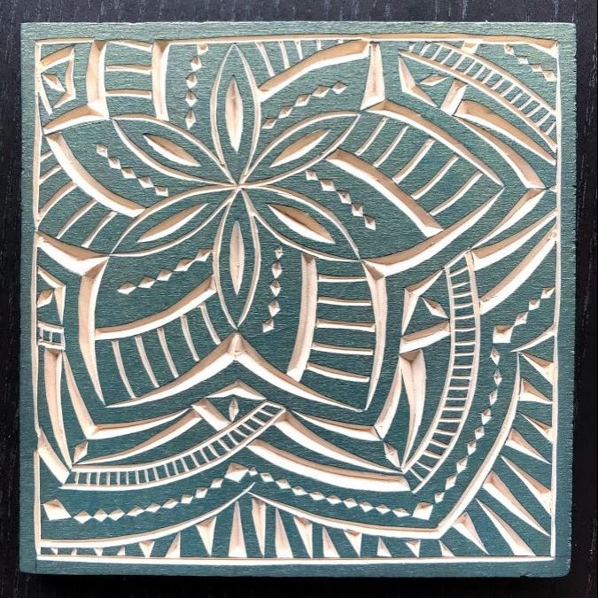 Carving on basswood with teal paint